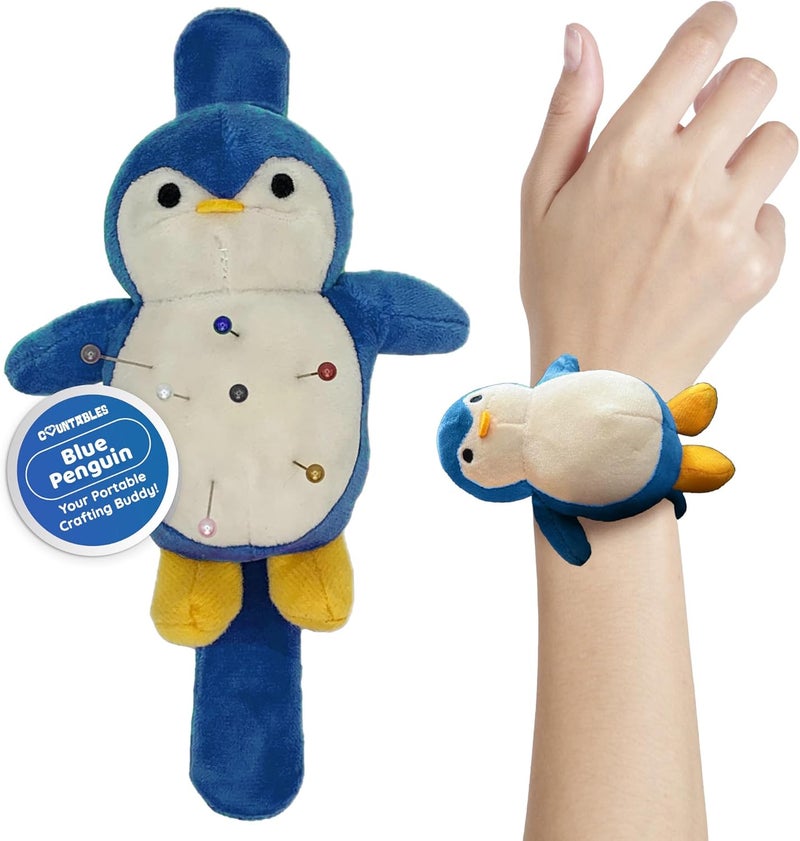 Countables Cute Penguin Wrist Pin Cushion for Sewing - Snap Bracelet Wrist Bands for Pins and Needles - Sewing Supplies and Accessories - Needle Minder & Holder - Adjustable Pincushions (Blue) - Image 1